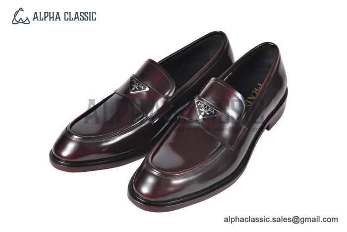 Prada Red Calfskin Loafers with the Iconic Enameled Metal Triangle Logo