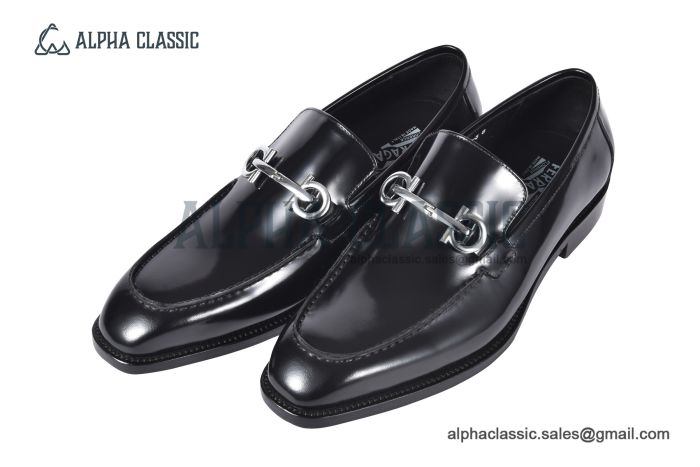 Ferragamo Black Calfskin Moccasin with Gancini Ornament and Unique Sutures