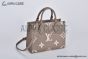 LV OnTheGo PM Bag Monogram Empreinte Leather Cream M45779