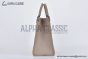 LV OnTheGo MM Bag Monogram Empreinte Leather Cream M45494