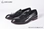 Prada Black Brushed Calfskin Loafers with the Iconic Enameled Metal Triangle Logo