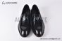 Prada Black Brushed Calfskin Loafers with the Iconic Enameled Metal Triangle Logo