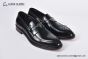 Prada Black Brushed Calfskin Loafers with the Iconic Enameled Metal Triangle Logo