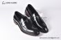 Prada Black Brushed Calfskin Loafers with the Iconic Enameled Metal Triangle Logo