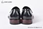 Prada Black Brushed Calfskin Loafers with the Iconic Enameled Metal Triangle Logo