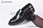 Prada Black Brushed Calfskin Loafers with the Iconic Enameled Metal Triangle Logo