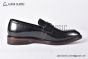 Prada Black Brushed Calfskin Loafers with the Iconic Enameled Metal Triangle Logo