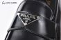 Prada Black Brushed Calfskin Loafers with the Iconic Enameled Metal Triangle Logo