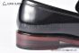 Prada Black Brushed Calfskin Loafers with the Iconic Enameled Metal Triangle Logo