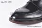 Prada Black Brushed Calfskin Loafers with the Iconic Enameled Metal Triangle Logo