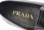 Prada Black Brushed Calfskin Loafers with the Iconic Enameled Metal Triangle Logo