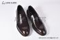 Prada Red Brushed Calfskin Loafers with the Iconic Enameled Metal Triangle Logo