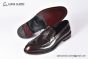 Prada Red Brushed Calfskin Loafers with the Iconic Enameled Metal Triangle Logo