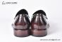 Prada Red Calfskin Loafers with the Iconic Enameled Metal Triangle Logo