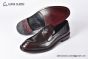 Prada Red Calfskin Loafers with the Iconic Enameled Metal Triangle Logo