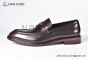 Prada Red Calfskin Loafers with the Iconic Enameled Metal Triangle Logo