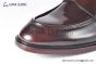 Prada Red Calfskin Loafers with the Iconic Enameled Metal Triangle Logo