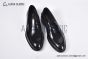 Prada Classic Brushed Black Calfskin Loafers