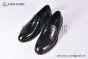 Prada Classic Brushed Black Calfskin Loafers