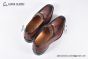 GUCCI Men's Brown Calfskin Loafers with YG Interlocking G
