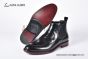 Prada Classic Brushed Black Calfskin Boot with the Triangle-embossed Logo