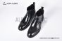 Prada Classic Brushed Black Calfskin Boot with the Triangle-embossed Logo