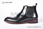 Prada Classic Brushed Black Calfskin Boot with the Triangle-embossed Logo