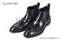 Prada Classic Brushed Black Calfskin Boot with the Iconic Enameled Metal Triangle Logo