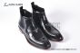 Prada Classic Brushed Black Calfskin Boot with the Iconic Enameled Metal Triangle Logo