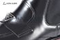 Prada Classic Brushed Black Calfskin Boot with the Iconic Enameled Metal Triangle Logo