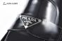 Prada Classic Brushed Black Calfskin Boot with the Iconic Enameled Metal Triangle Logo
