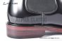 Prada Classic Brushed Black Calfskin Boot with the Iconic Enameled Metal Triangle Logo