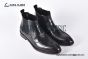 Prada Classic Brushed Matte Black Calfskin Boot with the Iconic Enameled Metal Triangle Logo