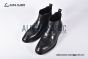 Prada Classic Brushed Matte Black Calfskin Boot with the Iconic Enameled Metal Triangle Logo