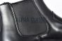Prada Classic Brushed Matte Black Calfskin Boot with the Iconic Enameled Metal Triangle Logo