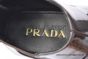 Prada Classic Brushed Red Calfskin Boot with the Iconic Enameled Metal Triangle Logo