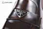 Prada Classic Red Double Sutures Calfskin Boot with the Iconic Enameled Metal Triangle Logo