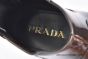 Prada Classic Red Double Sutures Calfskin Boot with the Iconic Enameled Metal Triangle Logo