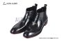 Prada Classic Black Calfskin Boot with the Iconic Enameled Metal Triangle Logo