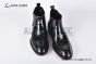 Prada Classic Black Calfskin Boot with the Iconic Enameled Metal Triangle Logo