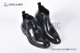 Prada Classic Black Calfskin Boot with the Iconic Enameled Metal Triangle Logo
