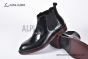 Prada Classic Black Calfskin Boot with the Iconic Enameled Metal Triangle Logo