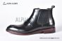 Prada Classic Black Calfskin Boot with the Iconic Enameled Metal Triangle Logo