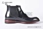 Prada Classic Black Calfskin Boot with the Iconic Enameled Metal Triangle Logo