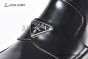 Prada Classic Black Calfskin Boot with the Iconic Enameled Metal Triangle Logo