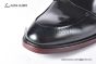 Prada Classic Black Calfskin Boot with the Iconic Enameled Metal Triangle Logo