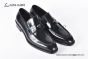 Ferragamo Black Calfskin Loafer with Mental Logo