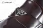 Prada Classic Red Calfskin Boot with the Iconic Enameled Metal Triangle Logo