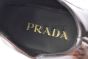 Prada Classic Red Calfskin Boot with the Iconic Enameled Metal Triangle Logo