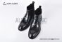 Prada Classic Smooth Black Calfskin Boot with the Iconic Enameled Metal Triangle Logo
